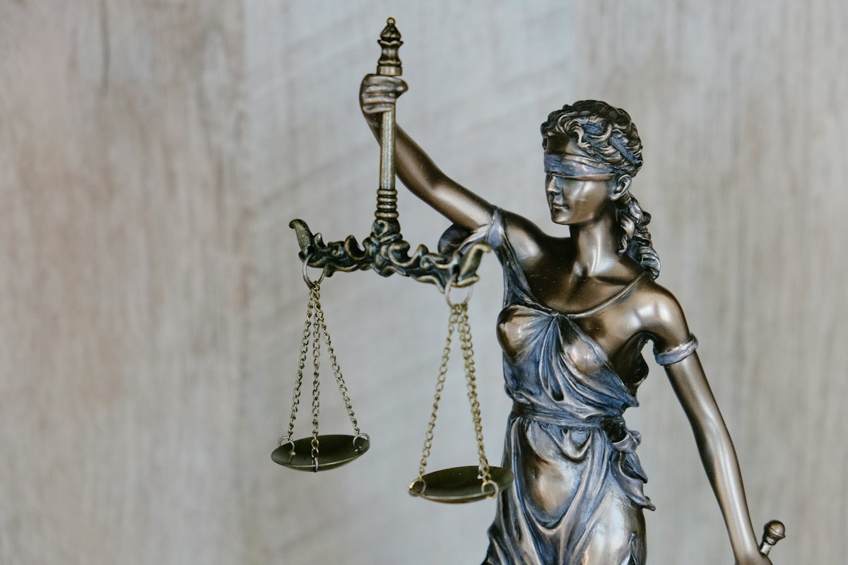 A statue of justice holding scales