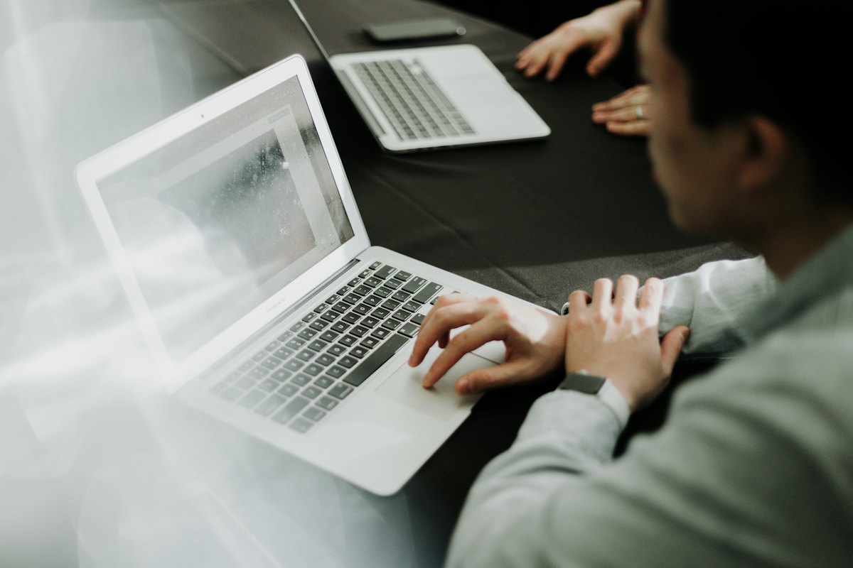 A man working at a laptop
